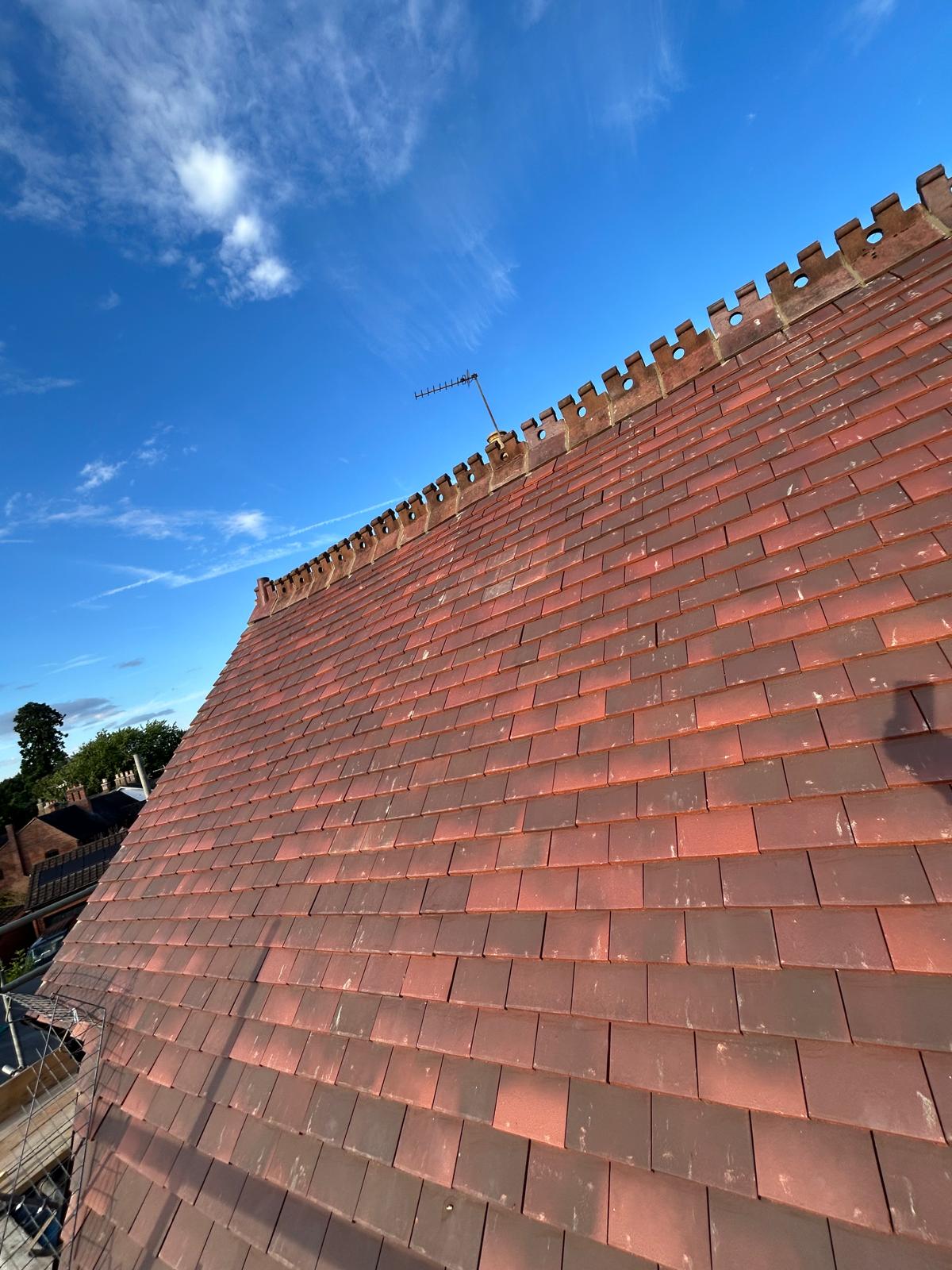 Clay tile pitched roof installation