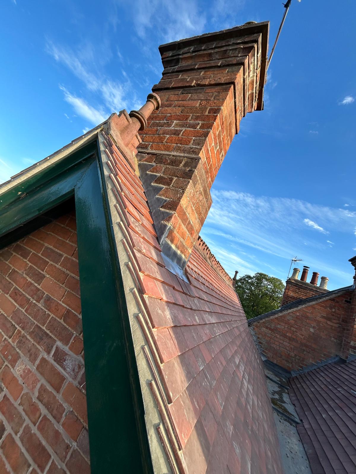 Completed terrace roof with brick chimney