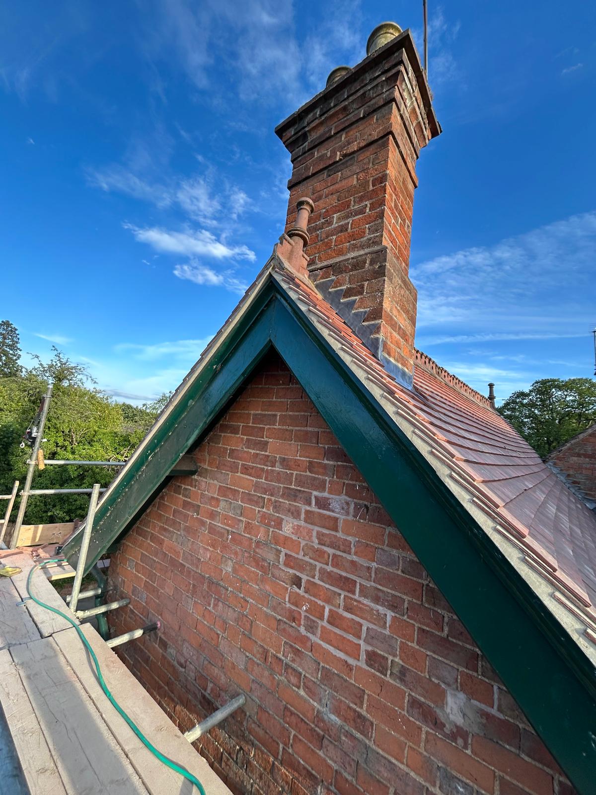 Chimney restoration and roof tiling