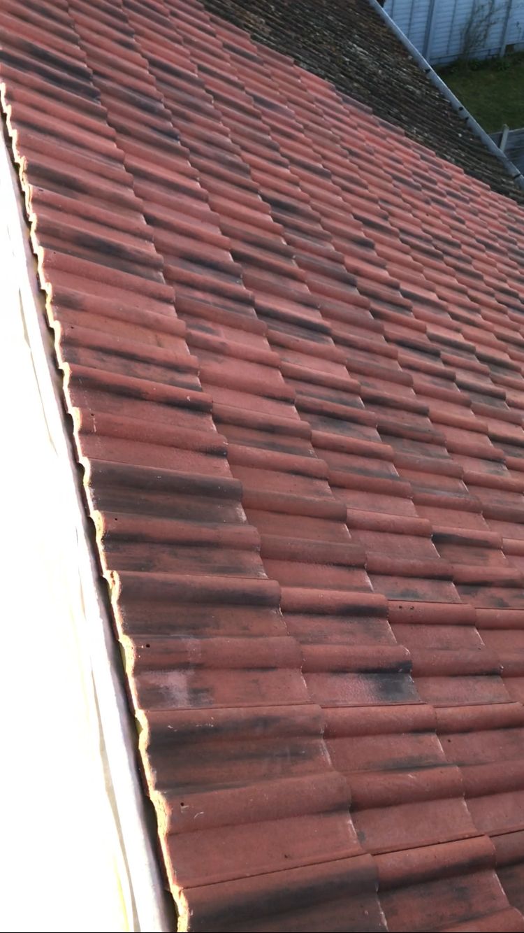 Clay tile roof with new ridge detail